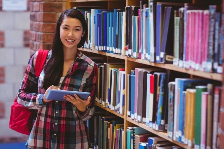 business student in library at university to learn business idiom examples