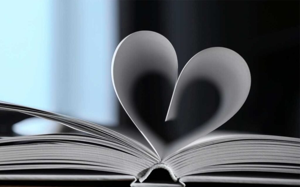 book pages in a shape of a heart for love idioms