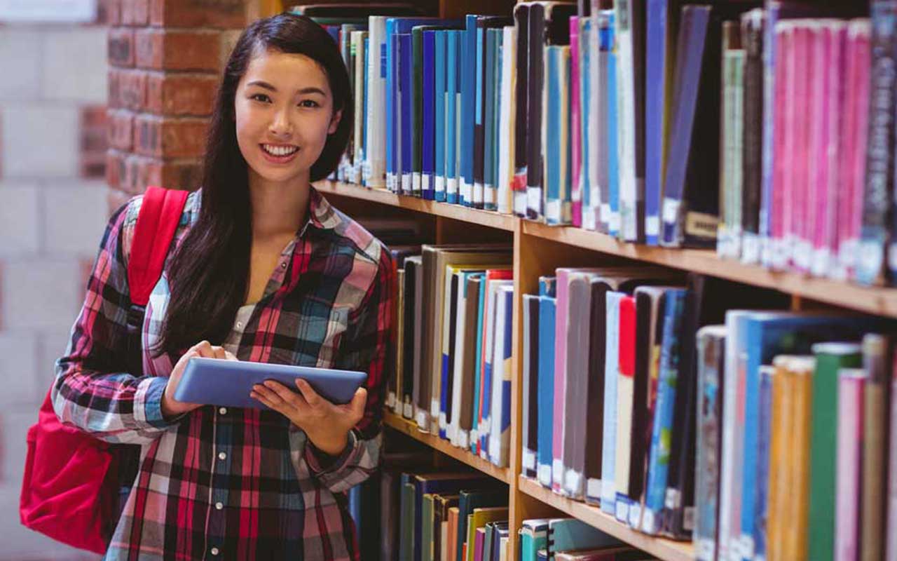 English Idiom Examples 6 student learning business idioms in a library