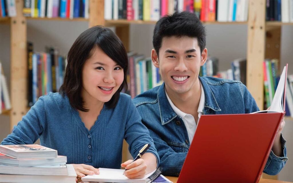 happy chinese students learning english