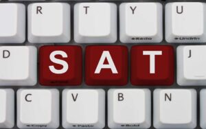 Digital SAT Prep for Beginners: SAT English in 9 Steps 3 digital SAT pronoun antecedent agreement with sat written in purple on a gray keyboard