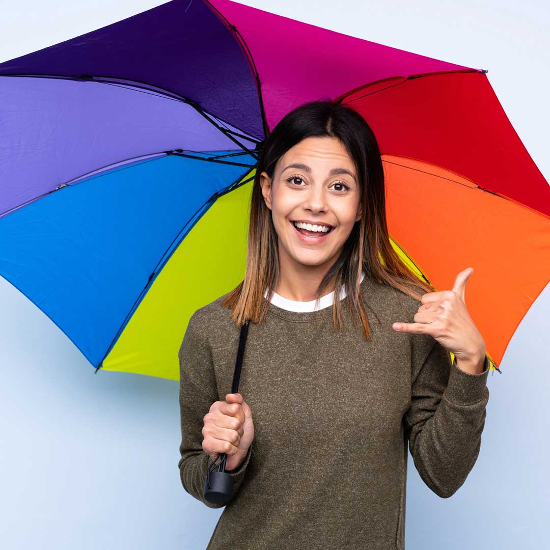 rain idioms image lady with rainbow umbrella as part of weather idioms series