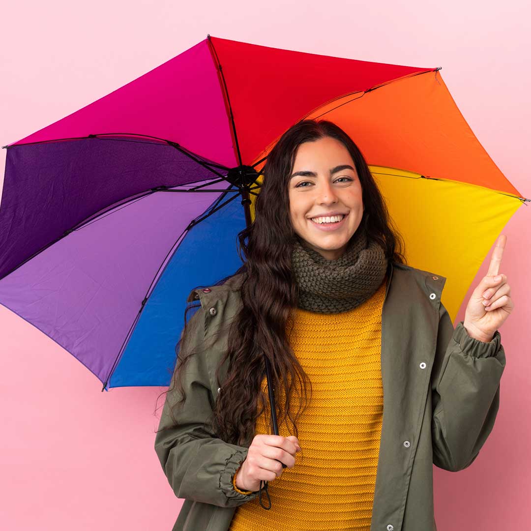rain idioms image lady with rainbow umbrella as part of weather idioms series